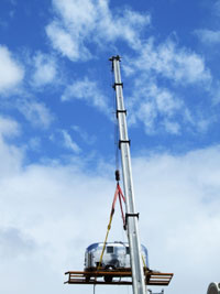 Airstream hoisted to roof of S. Africa Hotel