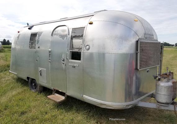 Airstream before polishing and repairs.