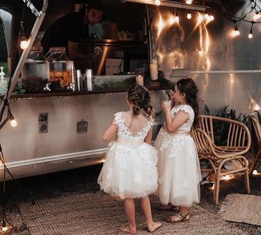 flower girls by Airstream trailer