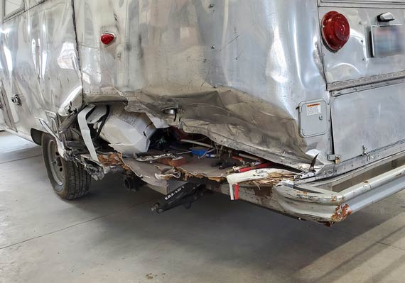 Airstream vs. BMW damaged back corner